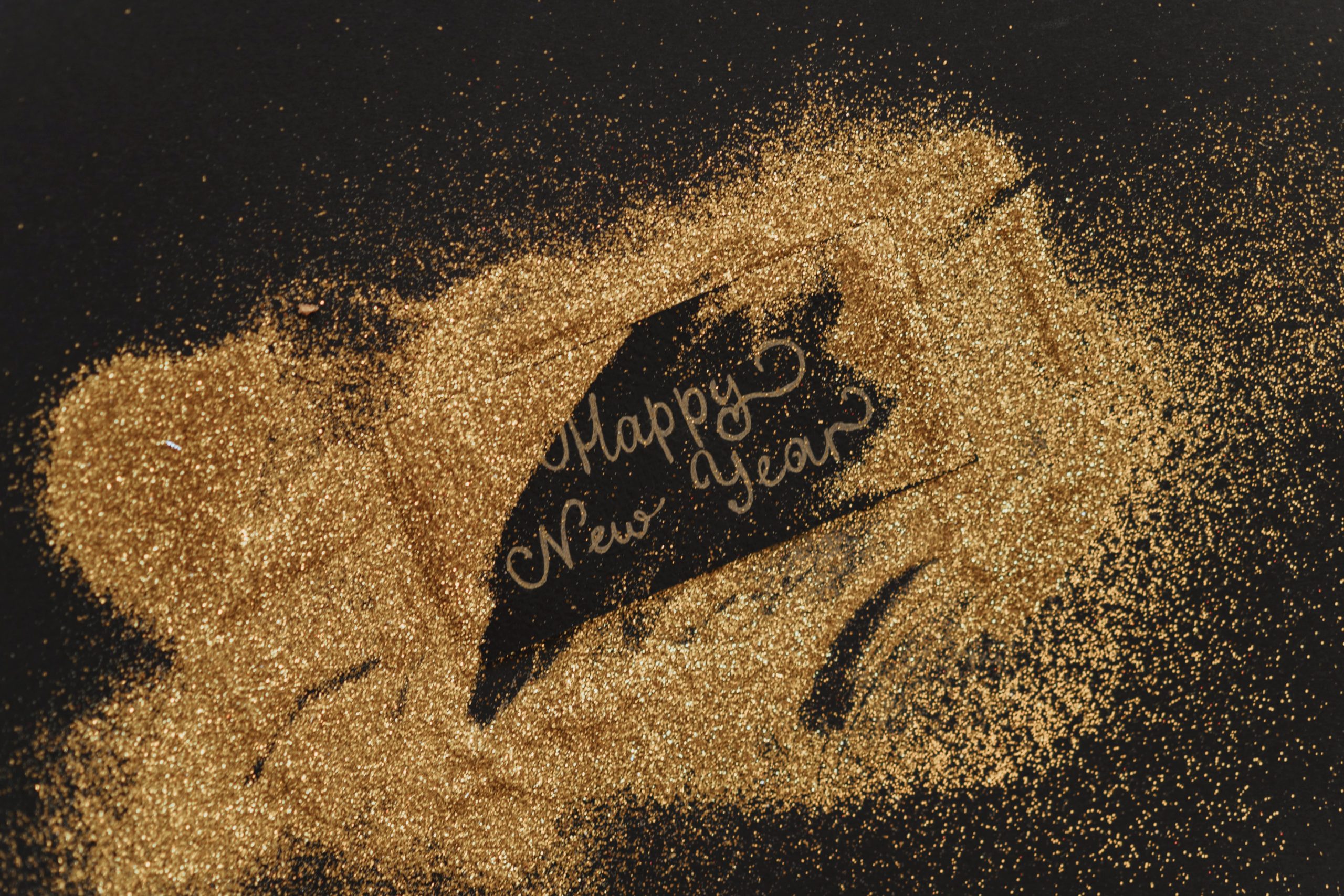 Photo by olia danilevich: https://www.pexels.com/photo/happy-new-year-greeting-card-with-glitters-6149104/